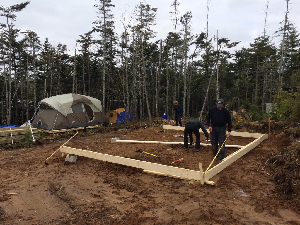 Squaring the foundation for the off grid cabin