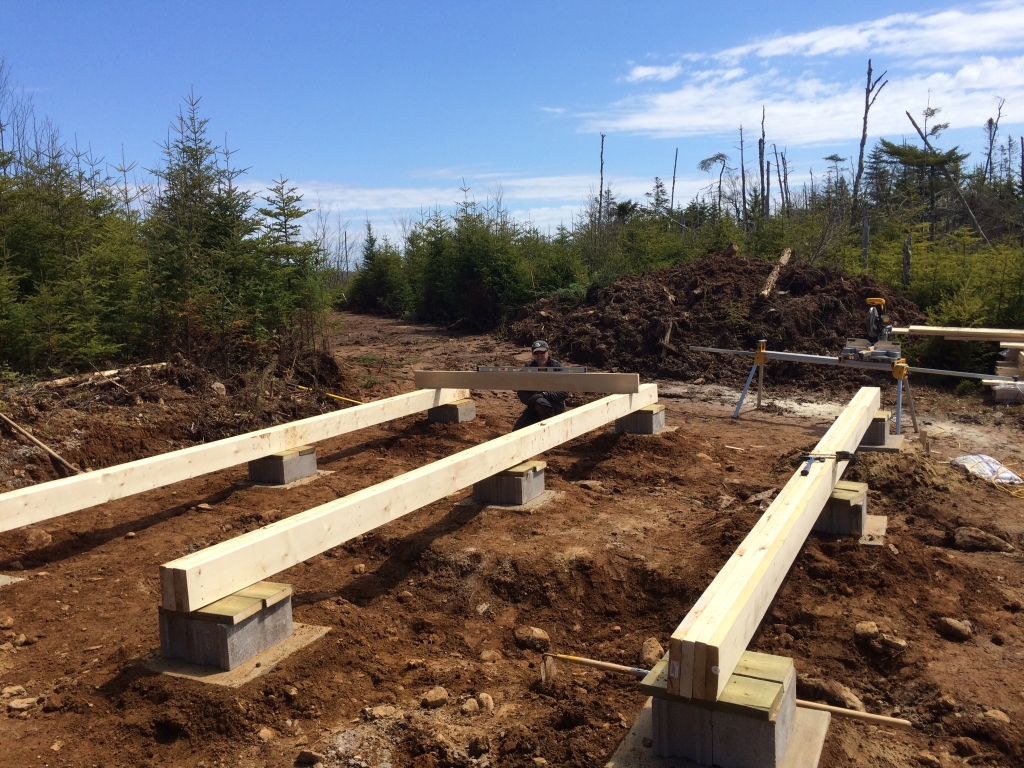 building a log cabin on concrete slab