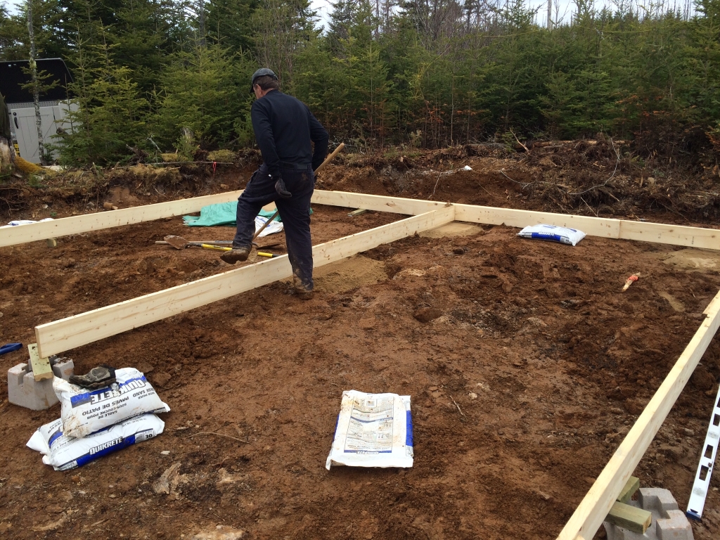 Laying out the of grid cabin foundation