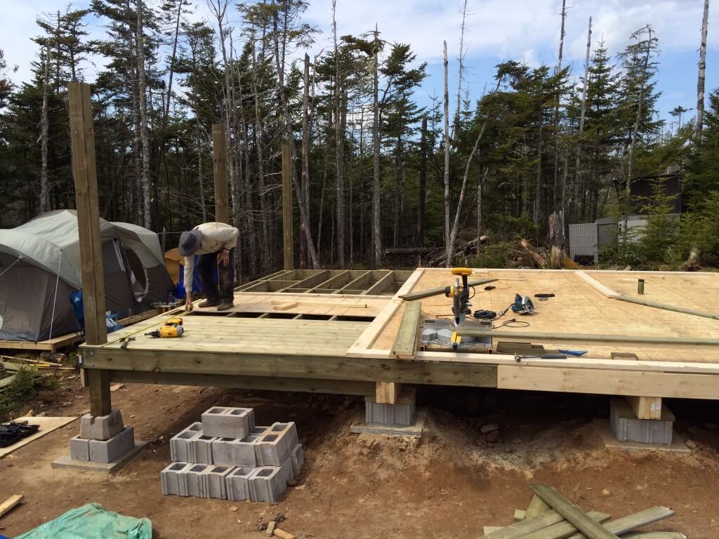 Cabin front deck pressure treated decking install 2
