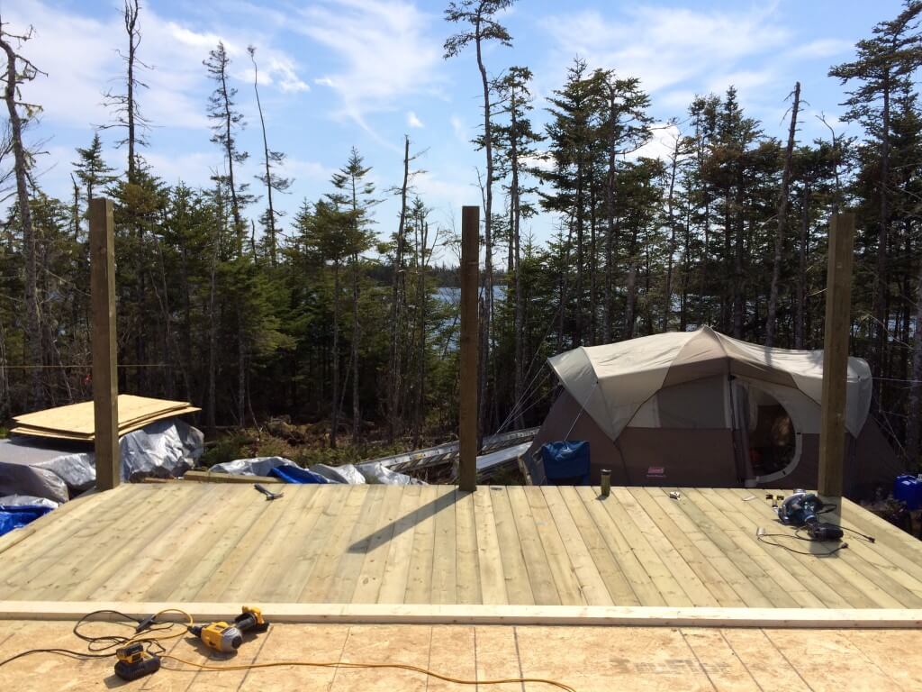 Cabin front deck pressure treated decking install complete 2