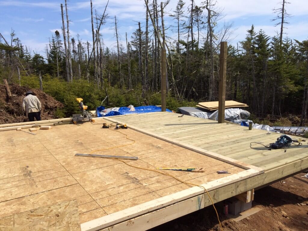 Cabin front deck pressure treated decking install complete