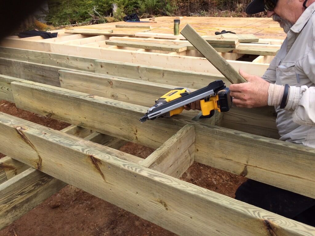 Cabin front deck subfloor framing cross bracing