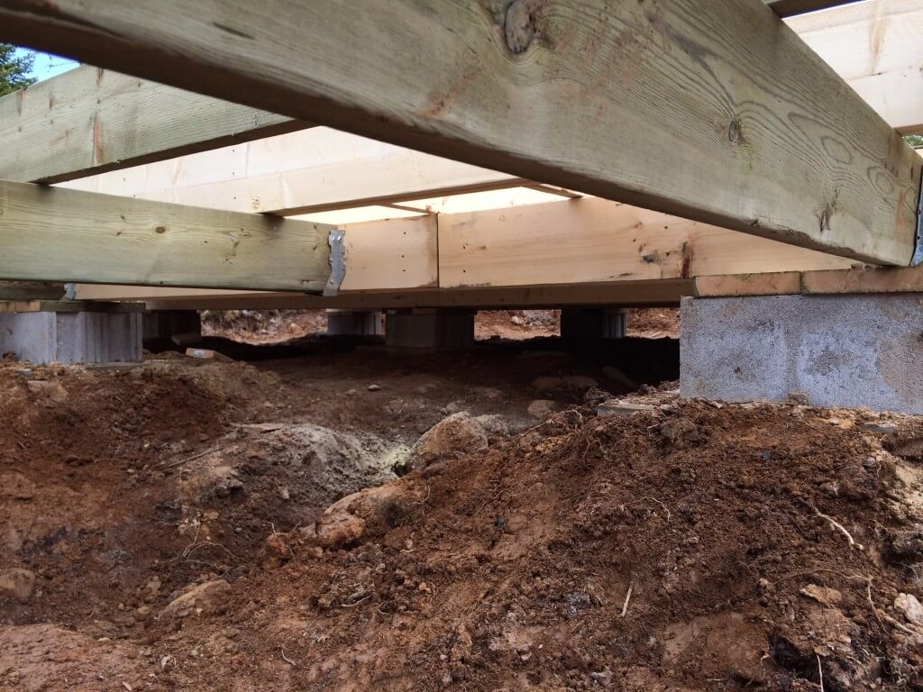 Cabin front deck subfloor framing with joist hangars 2