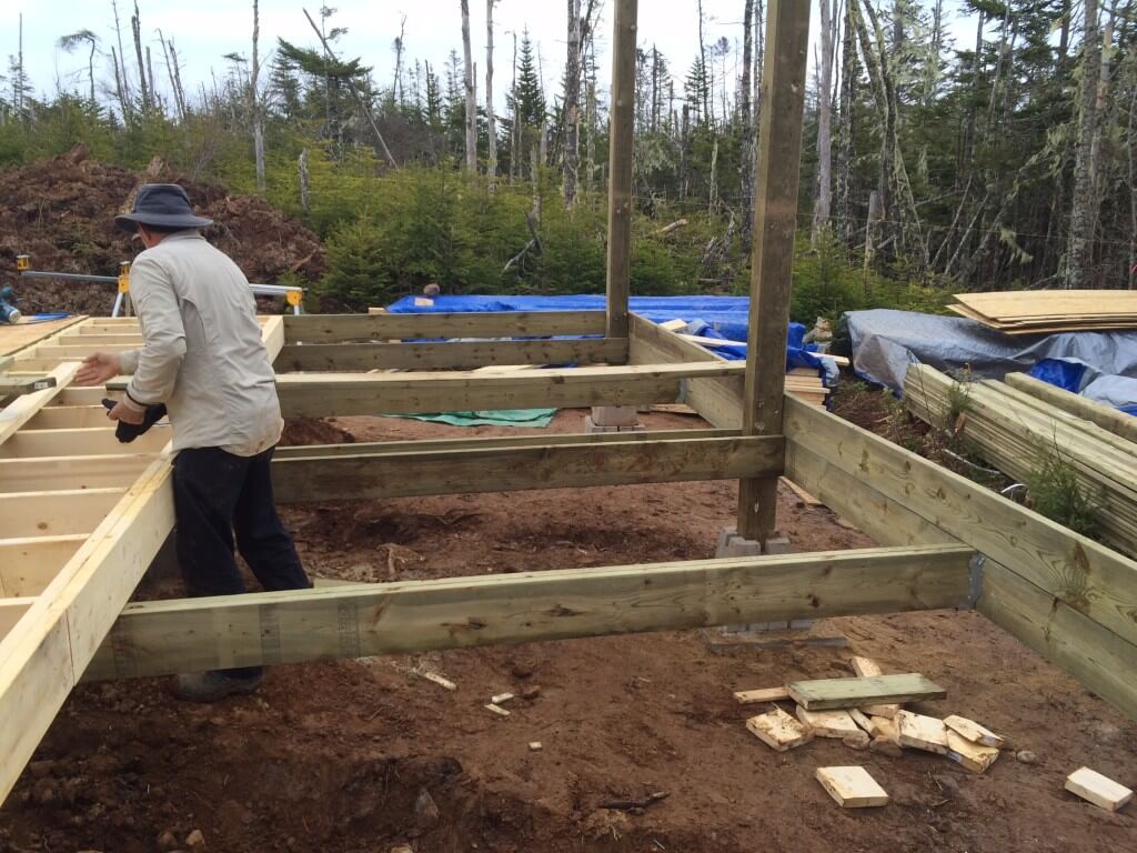 Cabin front deck subfloor framing