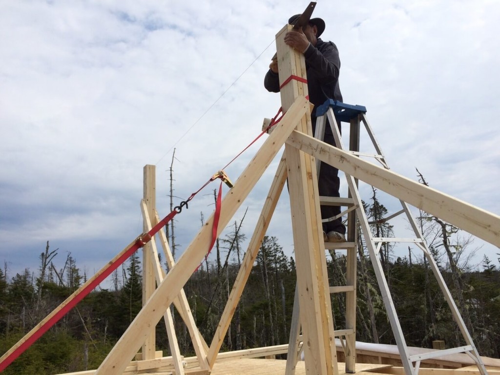 Trimming-The-Off-Grid-Cabin-Roof-Ridge-Beam-Post-2