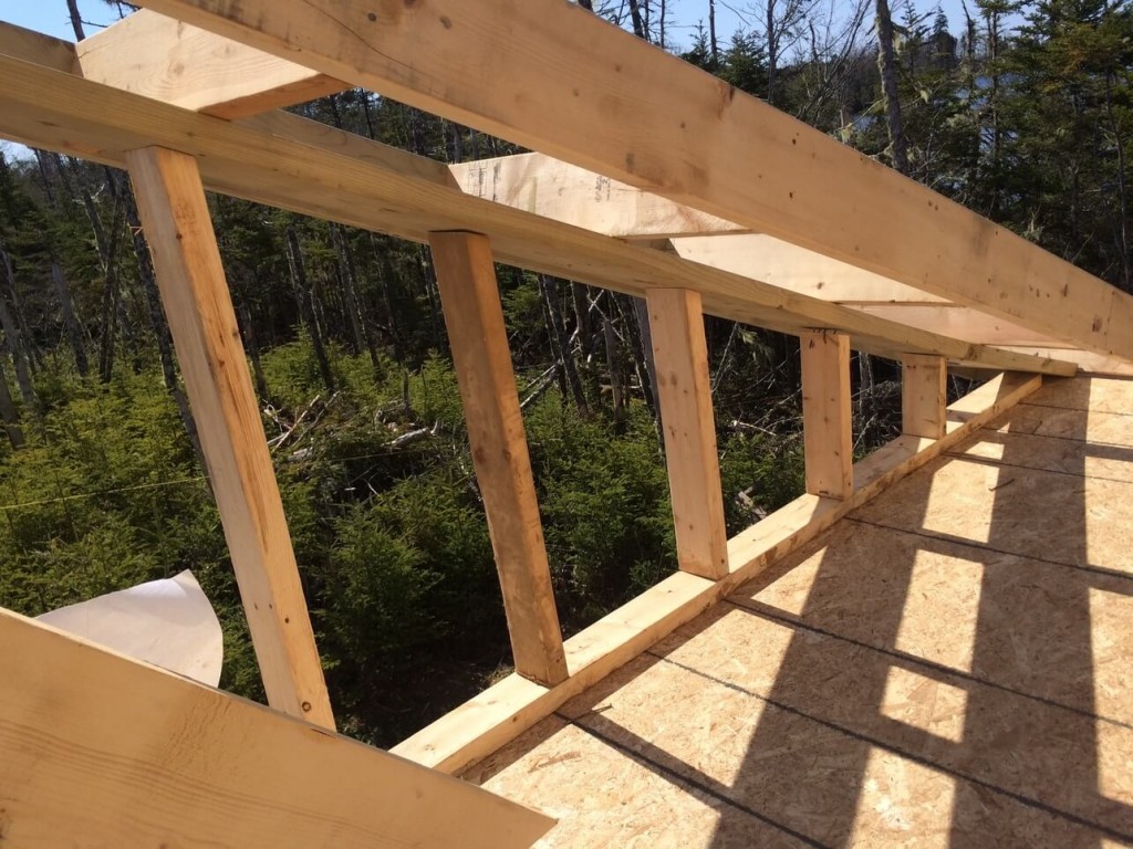 The-Off-Grid-Cabin-Roof-Rake-Ladder-Framing-Over-The-East-Deck-Complete