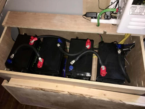 the off grid cabin solar system batteries inside box