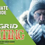 Image of man trying to warm his hands in the extreme off grid cold with the title Off Grid Heating